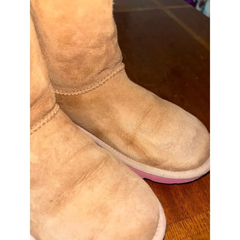 UGG kids’ Bailey Bow II chesnut brown and pink boots with bows on back (size 5)